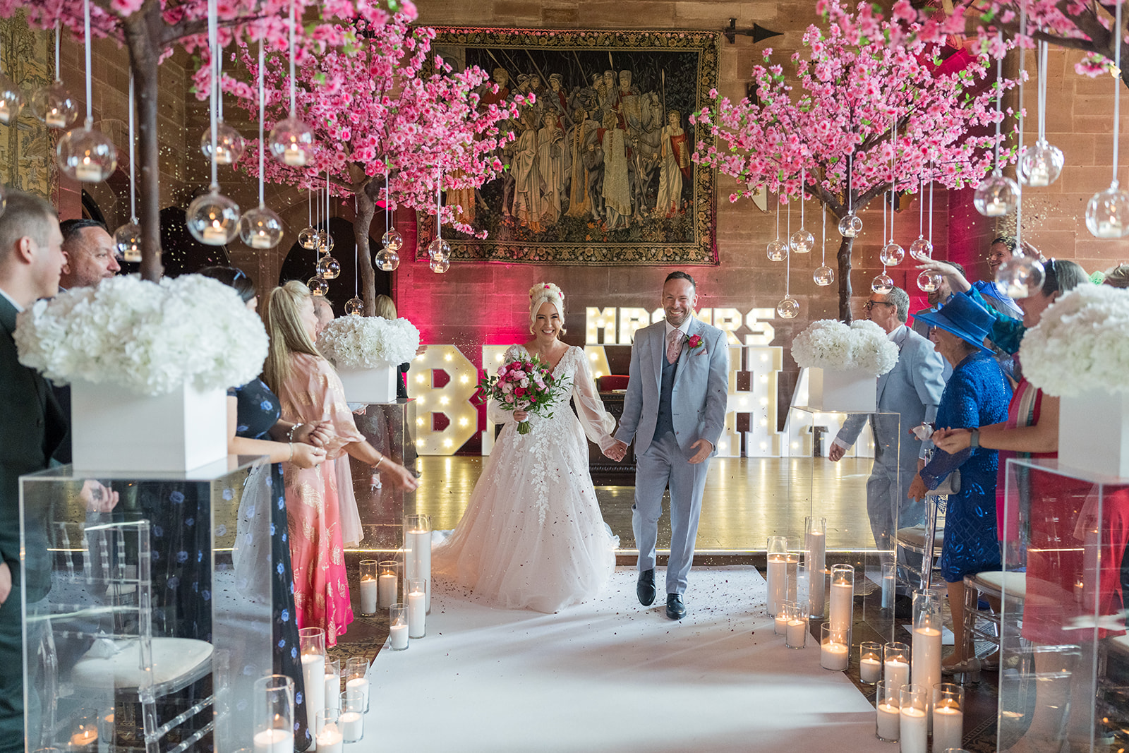 Bride and groom just married at Peckforton Castle wedding venue in Cheshire